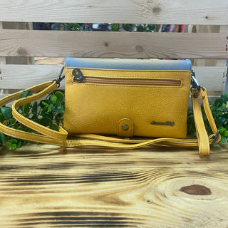 American Bling Canyon Glow Clutch, a yellow textured clutch with a light blue top flap and a long strap.