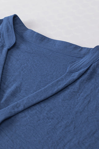 Close-up of the Canyon Horizon Blouse, showing the blue boho crinkle V-neck fabric and collar detail.