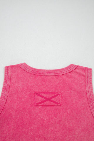 Close-up of the back of a Canyon Rose Tank, showing the vintage fuchsia fabric and a small "X" detail.