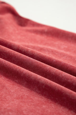 Close-up of the Canyon Sunset Tank fabric, showing its soft, textured, boho sunset red material with gentle folds.