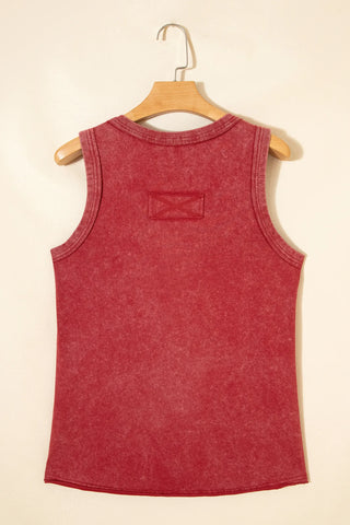 Back view of a red Canyon Sunset Tank with a distressed, washed look, hanging on a wooden hanger.