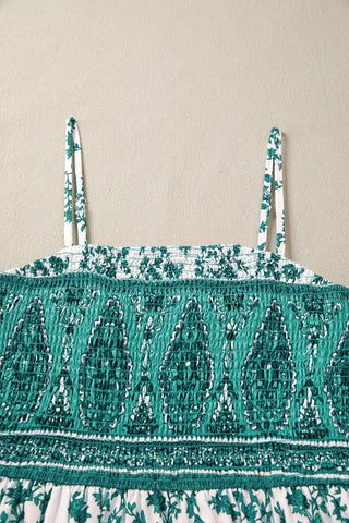 Close-up of a Country Breeze Maxi Dress, featuring a shirred bodice with a green and white floral pattern.