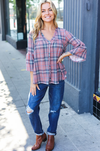 A stepped back look at the Cowgirl Classic Plaid Blouse