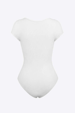 Back of White Cowgirl Core Essential Bodysuit on a plain background