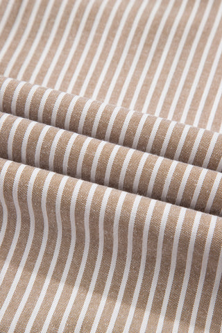 Close-up of the Daisy Lane Maxi Dress fabric, showing a brown and white striped pattern with soft folds.