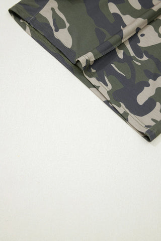 Close-up of Desert Trail Camo Shorts, showing the green, brown, and tan camouflage fabric and stitching.