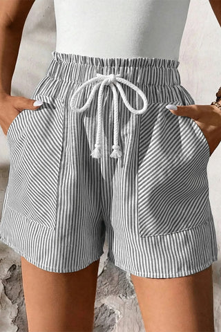 Close-up of Fresh Linen Stripe Shorts with a white drawstring, elastic waist, and pockets.