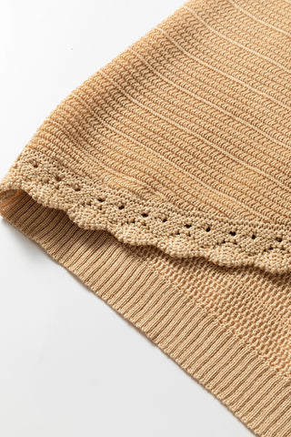 Close-up of the Golden Hour Sleeveless Top, showing the intricate crochet knit and ribbed hem in a light tan.