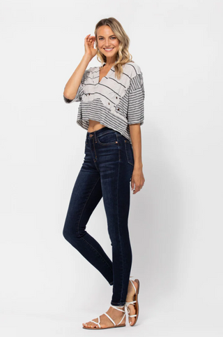 Farm girl wearing Judy Blue Mid Rise Skinny Fit Dark Wash Jeans