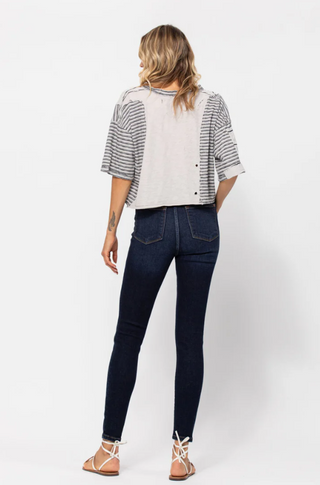 Back of a farm girl wearing Judy Blue Mid Rise Skinny Fit Dark Wash Jeans