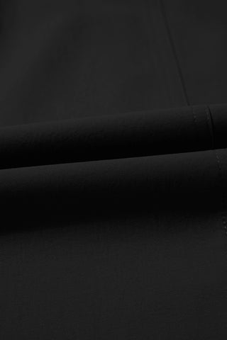 Close-up of the Midnight Prairie Wide Pants, showing the soft, flowing fabric of the relaxed black palazzo pants.