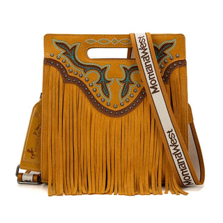 Mustard yellow Montana West crossbody purse with fringe, turquoise embroidery, studs, and a logo strap.