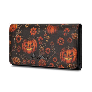 Montana West wallet with a black background, orange jack-o'-lanterns, and floral patterns.