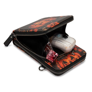 Open Montana West Pumpkin Halloween Crossbody Phone Wallet with a clear earbud case and small bottle inside.