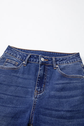 Close-up of the waist and upper thighs of Open Sky Bootcut Jeans, showing the button, zipper, and pockets.