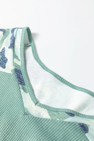 Close-up of a Prairie Camo Dreams Top, showing the sage green ribbed fabric and blue/green camo print.