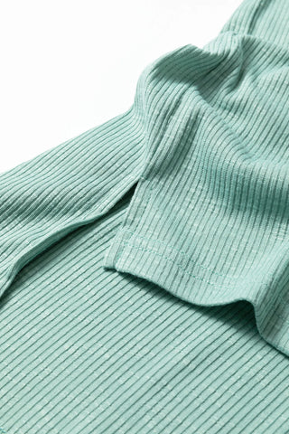 Close-up of the ribbed texture and sage green color of the Prairie Camo Dreams Top.