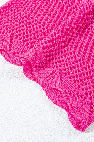 Close-up of a bright pink Boho Chevron Knit Top with a scalloped hem and open-knit pattern.