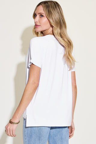 Blonde Woman Wearing White Farm Girl V-Neck T-Shirt.