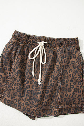Wildcat Drawstring Skort, a brown and black leopard print skort with an elastic waist and white drawstring.
