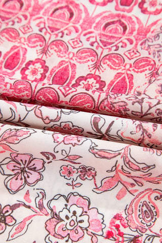 Close-up of a Wildflower Patchwork Maxi Skirt with pink and white boho floral patterns.