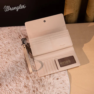 Open beige Wrangler wallet with card slots, ID window, and RFID protection, on a cowhide surface.