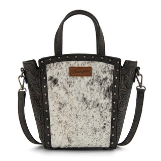 Wrangler black tote/crossbody with genuine hair-on cowhide front, studded trim, and floral embossed sides.