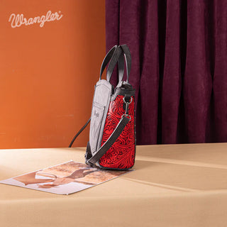 Red and black Wrangler hair-on cowhide tote/crossbody bag with floral tooling, a wallet, and a removable strap.