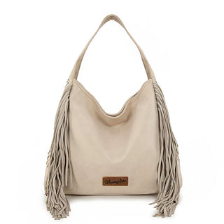Beige Wrangler hobo bag with long fringe on both sides and small studs along the top edge of the fringe.