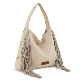 Beige Wrangler hobo bag with studded details and long fringe hanging from the sides.