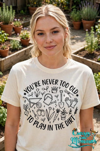 Dirt Play graphic tee on a natural shirt