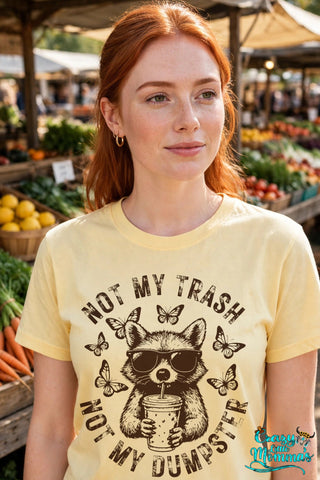Dumpster Trash graphic tee on a corn silk shirt