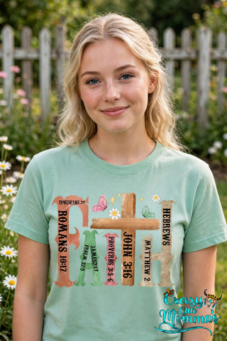 Faith graphic tee on a mint green shirt
