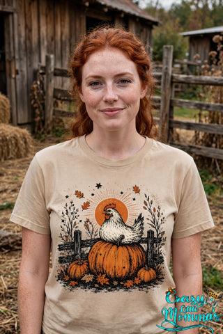 Fall Chicken graphic tee on a sand shirt