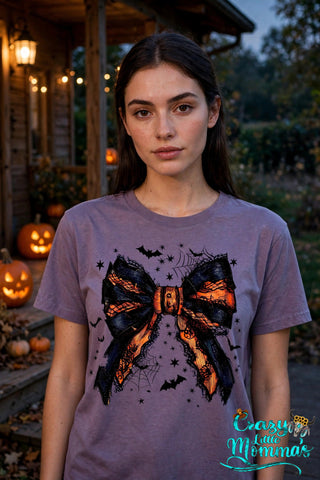 Gothic Bow graphic tee on a purple shirt